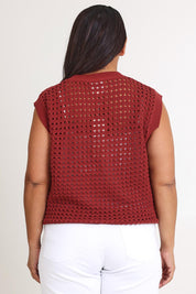 Model Ashleigh wearing size XL of the Love Language Cotton Vest in colour Rust, from the back