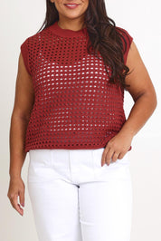 Model Ashleigh wearing size XL of the Love Language Cotton Vest in colour Rust, from the front, cropped image