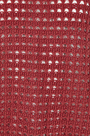 Product shot of the Love Language Cotton Vest in colour Rust, detail