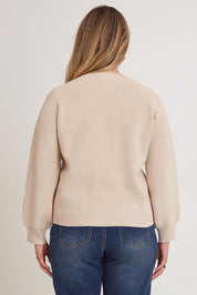 Model Chanel wearing size XL of the Always My Go To Jumper in colour Sand, from the back