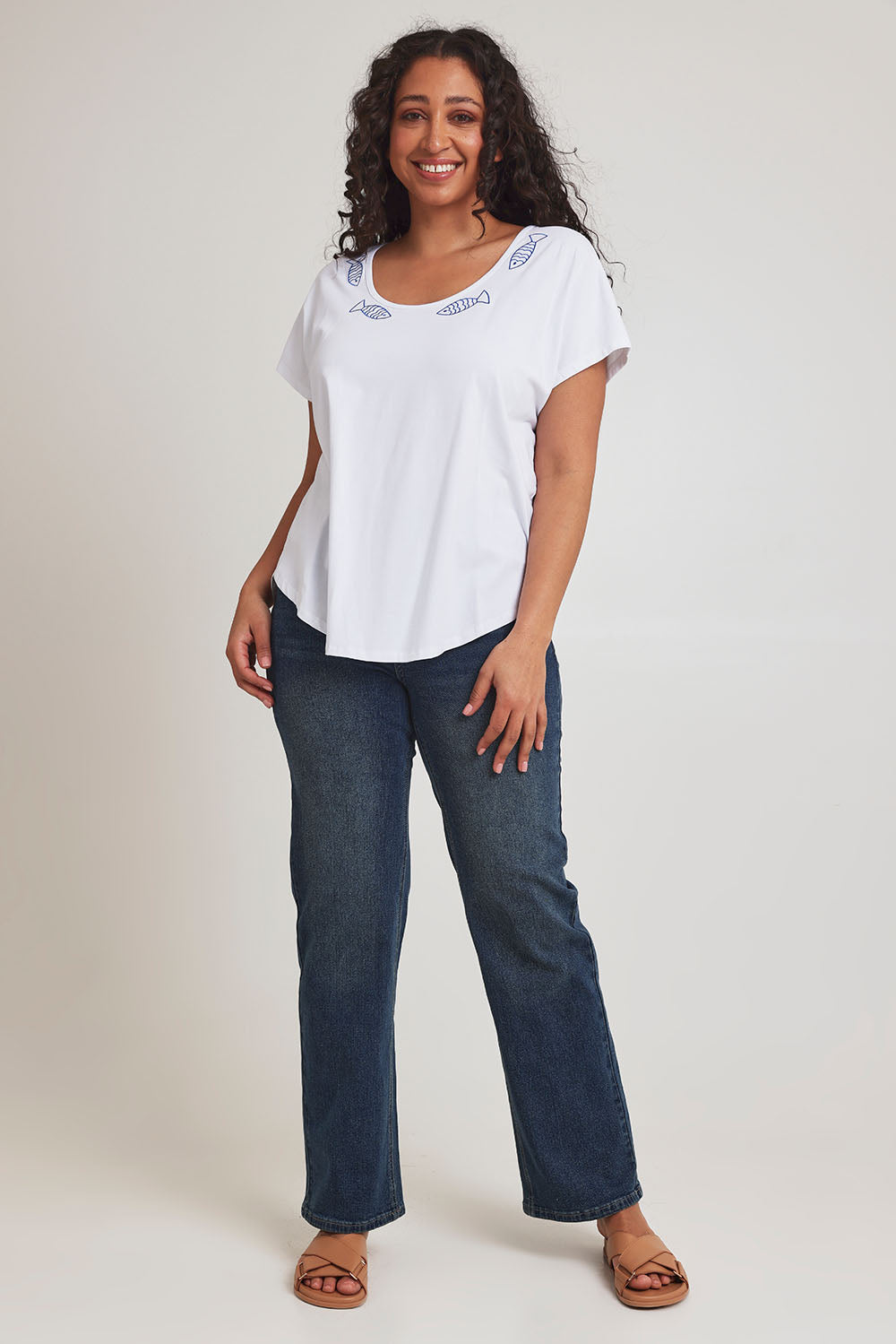 Model Terri-Leigh wearing size 14 of the Little Details Embroidered Tee in colour Whitefish (White), from the front, showing the whole outfit