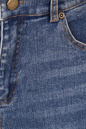 Product shot of the Daily Dose Longline Denim Shorts in colour Denim (Blue), detail