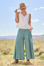 Model Tegan wearing size 10 of the Sweetie Pie Cotton Top in colour Milk (White), from the front, showing the whole outfit