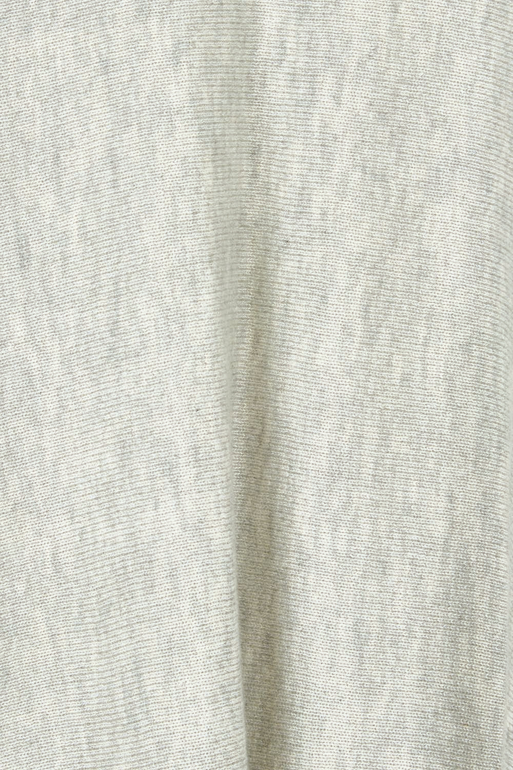 Product shot of the Light Breeze Poncho in colour Mist (Grey), detail