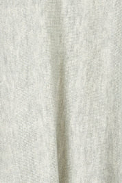 Product shot of the Light Breeze Poncho in colour Mist (Grey), detail