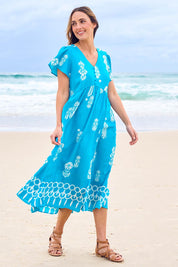 Model Tegan wearing size 10 of the Picture Perfect Midi Dress in colour Aqua (Blue), from the front, showing the whole outfit