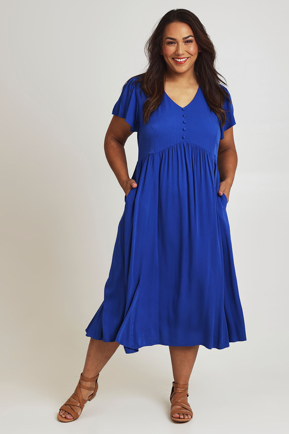 Model Ashleigh wearing size 16 of the Picture Perfect Midi Dress in colour Royal (Blue), from the front, showing the whole outfit