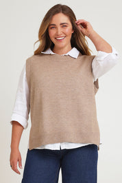 Model Chanel wearing size XL of the Found My Friend Recycled Knit Vest in colour Fawn, from the front, cropped image