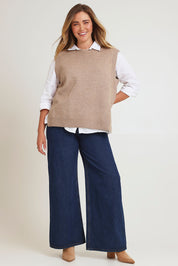Model Chanel wearing size XL of the Found My Friend Recycled Knit Vest in colour Fawn, from the front, showing the whole outfit