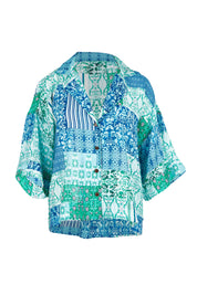 Product shot of the Happy Daze Shirt in colour Greenpatch (Green), from the front