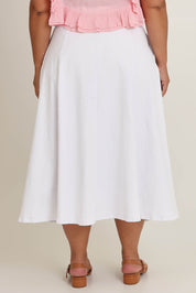 Model Ashleigh wearing size 16 of the Sparking Joy Denim Panelled Skirt in colour White (White), from the back