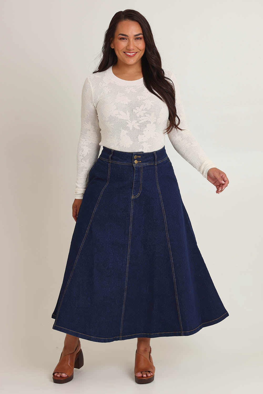 Model Ashleigh wearing size 16 of the Sparking Joy Denim Panelled Skirt in colour Denim (Blue), from the front, showing the whole outfit