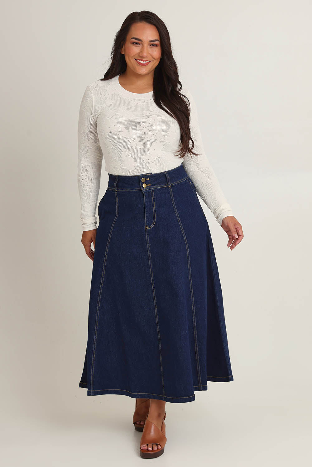 Model Ashleigh wearing size 16 of the Sparking Joy Denim Panelled Skirt in colour Denim (Blue), from the front, showing the whole outfit