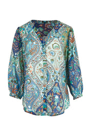 Product shot of the Easy On Me Blouse in colour Bluefolk (Blue), from the front