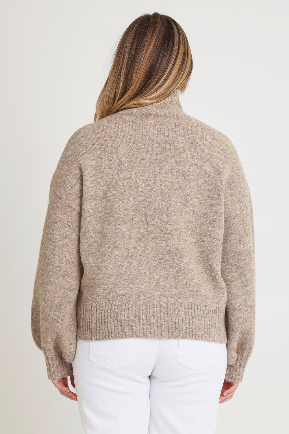 Model Chanel wearing size XL of the Lovely Day Billow Sleeve Wool Blend Jumper in colour Natural, from the back