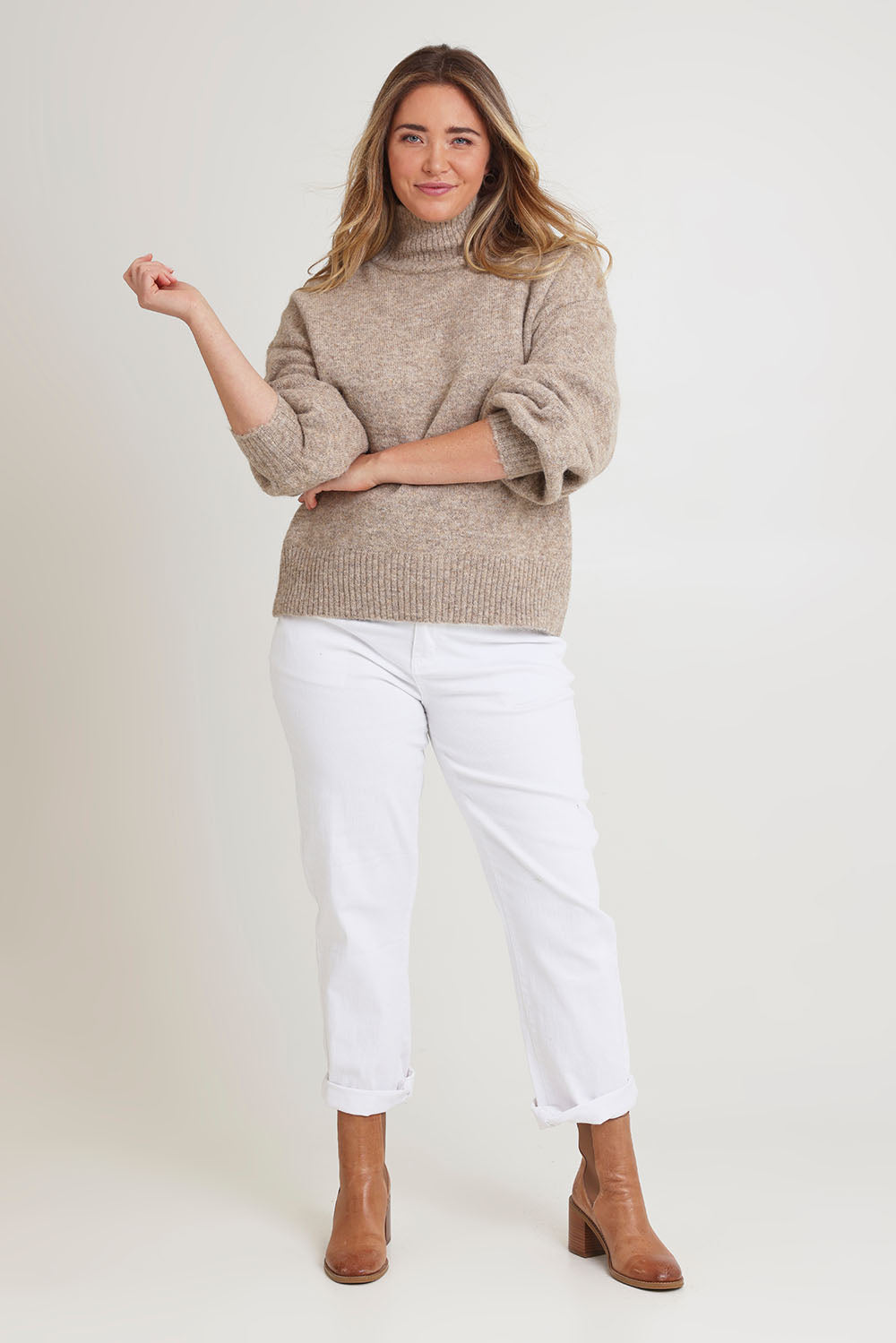 Model Chanel wearing size XL of the Lovely Day Billow Sleeve Wool Blend Jumper in colour Natural, from the front, showing the whole outfit