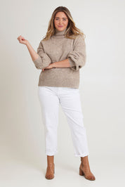 Model Chanel wearing size XL of the Lovely Day Billow Sleeve Wool Blend Jumper in colour Natural, from the front, showing the whole outfit