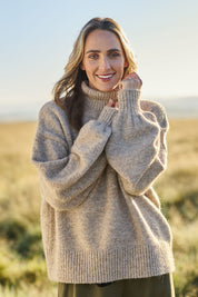 Model Tegan wearing size S of the Lovely Day Billow Sleeve Wool Blend Jumper in colour Natural, from the front, showing the whole outfit