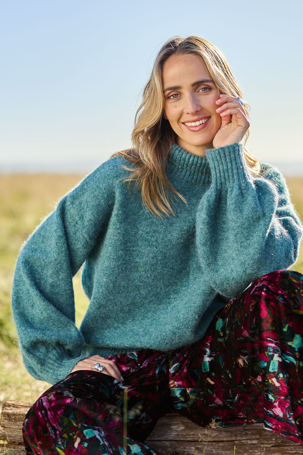 Model Tegan wearing size S of the Lovely Day Billow Sleeve Wool Blend Jumper in colour Sea (Green), from the front, showing the whole outfit