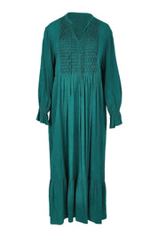 Product shot of the Meadow Meander Smocked Dress in colour Jade (Green), from the front