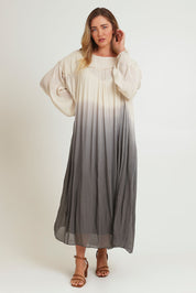 Model Chanel wearing size 16 of the First Love Gathered Ombre Dress in colour Earthombre, from the front, showing the whole outfit