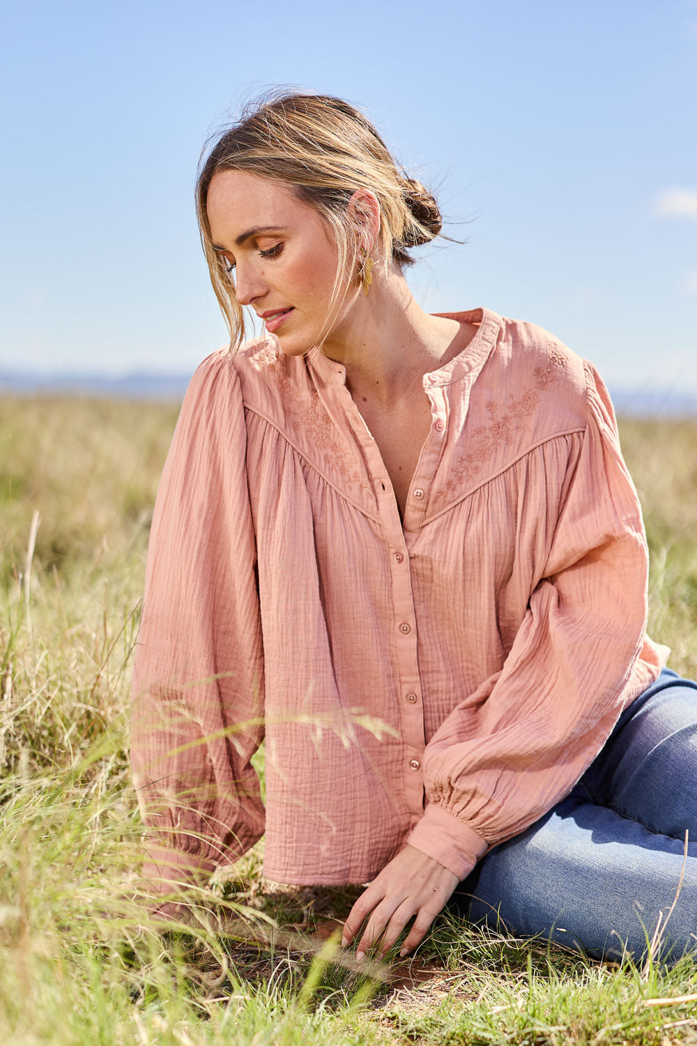 Model Tegan wearing size 10 of the Afternoon Delight Cotton Blouse in colour Dust (Pink), from the front, showing the whole outfit
