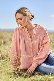 Model Tegan wearing size 10 of the Afternoon Delight Cotton Blouse in colour Dust (Pink), from the front, showing the whole outfit