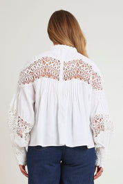 Model Chanel wearing size 16 of the High Tea With Me Cotton Blouse in colour White (White), from the back