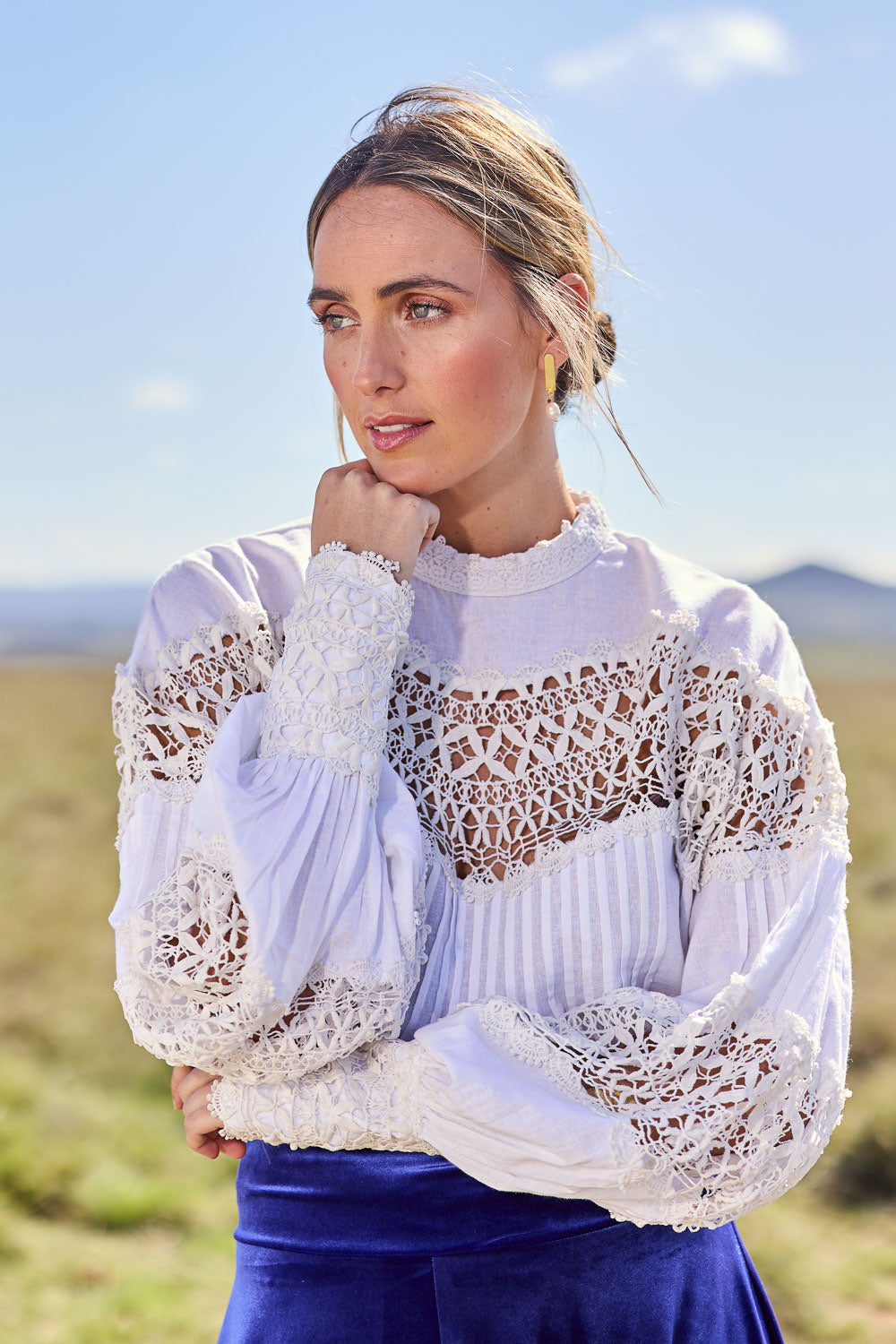 Model Tegan wearing size 10 of the High Tea With Me Cotton Blouse in colour White (White), from the front, showing the whole outfit