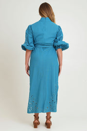 Model Chanel wearing size 16 of the Youre A Gem Button Detail Cotton Dress in colour Jade (Blue), from the back