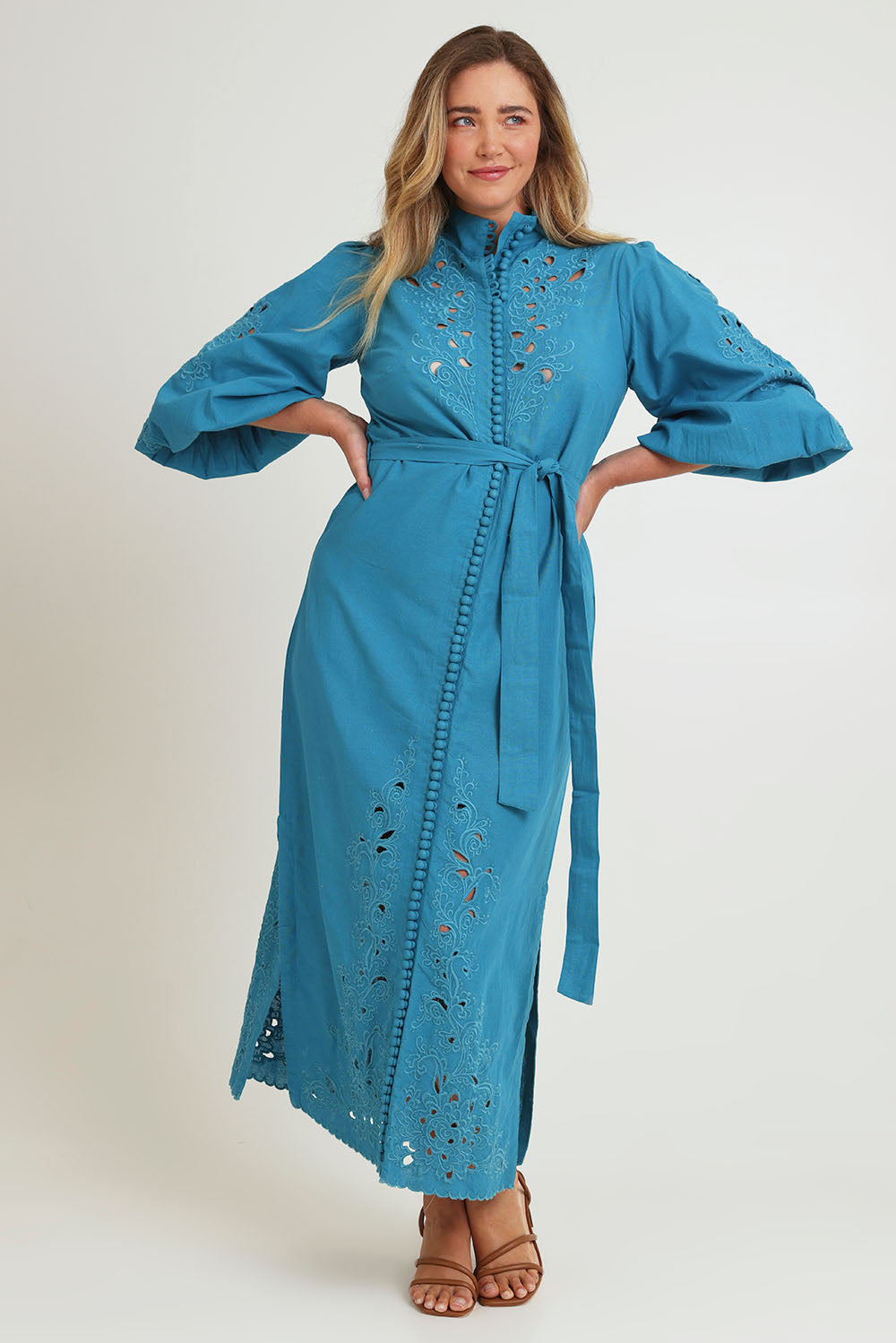 Model Chanel wearing size 16 of the Youre A Gem Button Detail Cotton Dress in colour Jade (Blue), from the front, showing the whole outfit