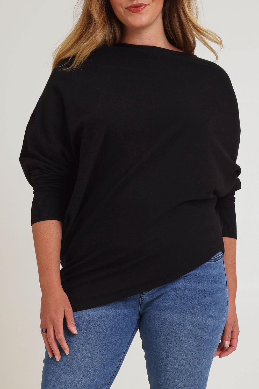 Model Chanel wearing size XL of the Snuggle Up True Knit Jumper in colour Black (Black), from the front, cropped image