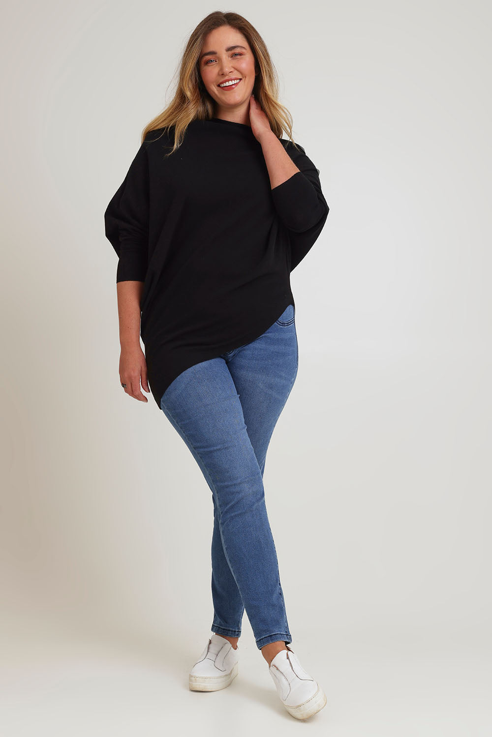 Model Chanel wearing size XL of the Snuggle Up True Knit Jumper in colour Black (Black), from the front, showing the whole outfit