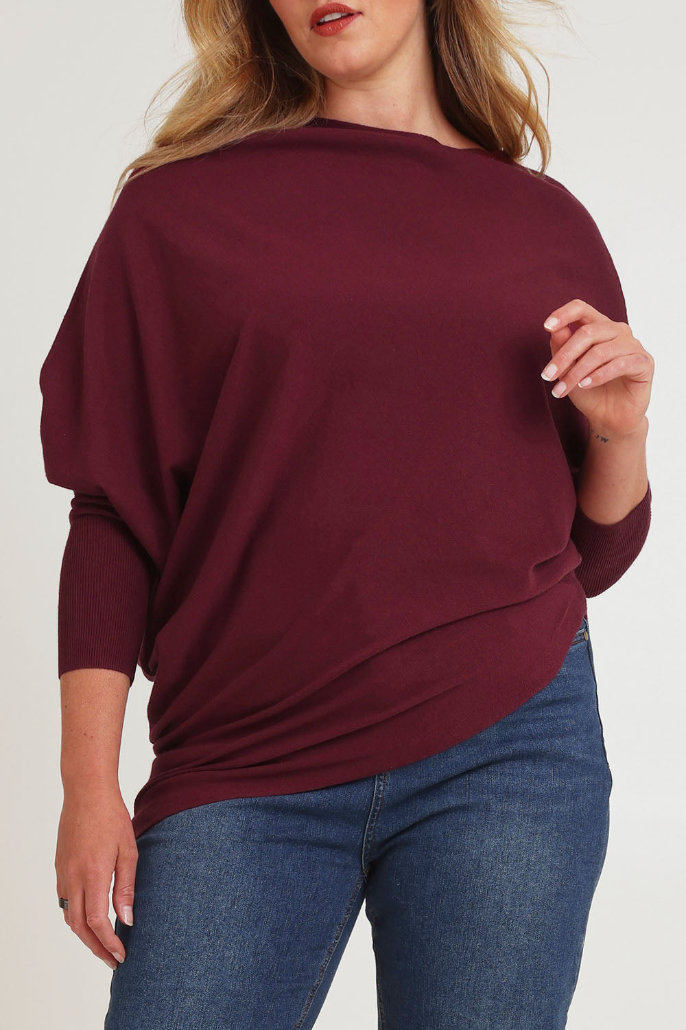 Model Chanel wearing size S of the Snuggle Up True Knit Jumper in colour Plum (Purple), from the front, cropped image