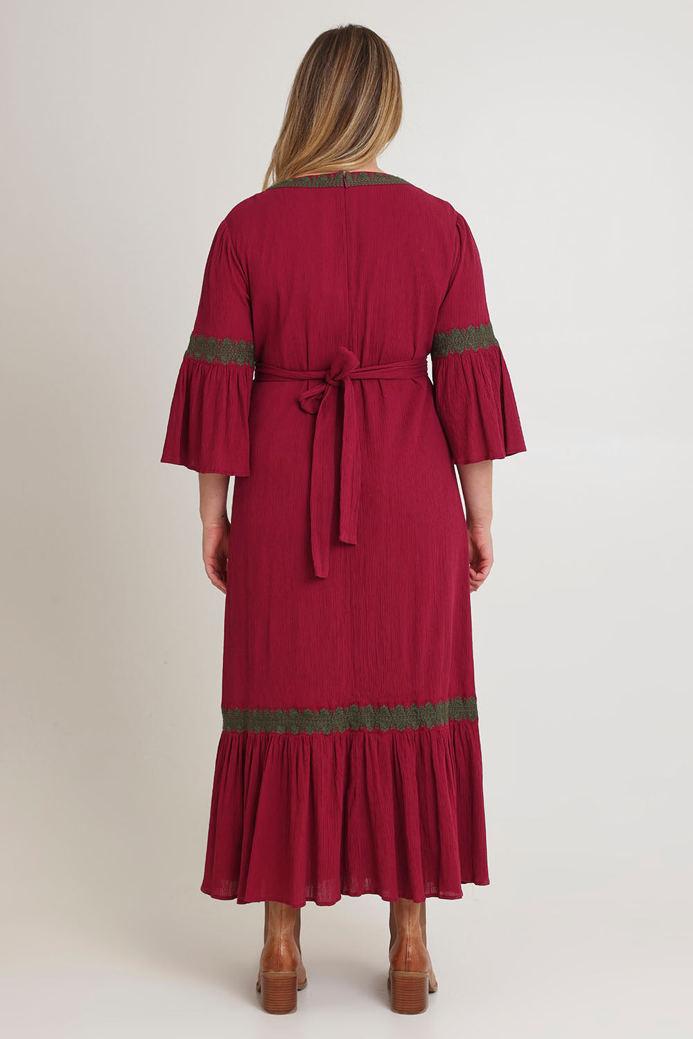 Model Chanel wearing size 16 of the Perfect As You Are Long Sleeve Maxi Dress in colour Plum (Purple), from the back
