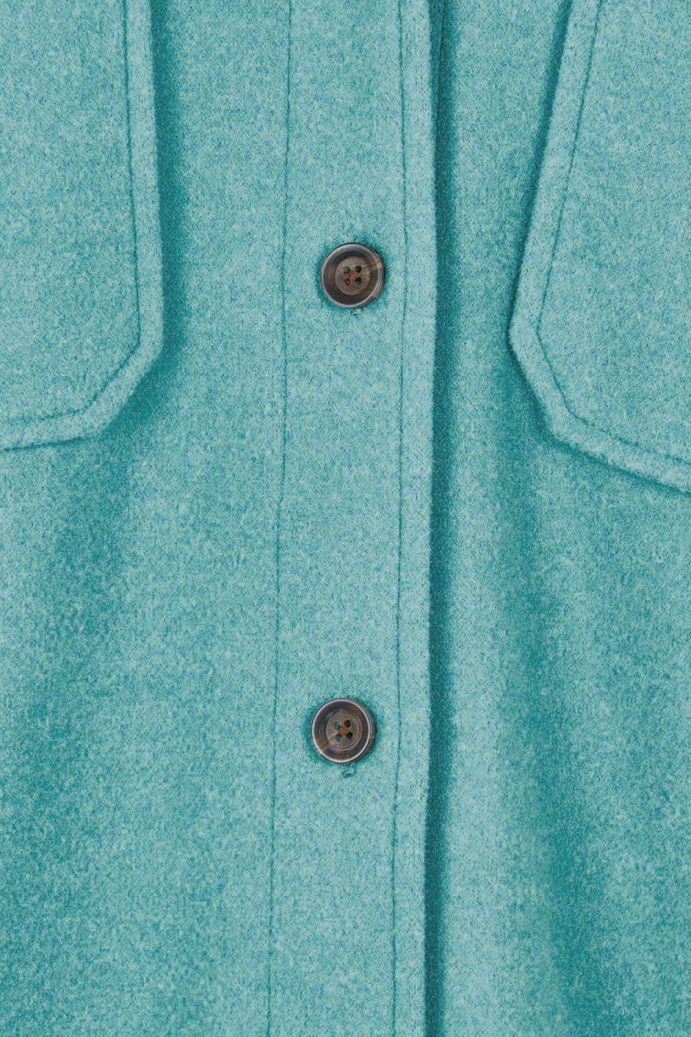 Product shot of the Through The Trees Jacket in colour Teal (Blue), detail