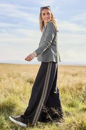 Model Tegan wearing size 10 of the Follow My Lead Side Stripe Pants in colour Black (Black), from the front, showing the whole outfit