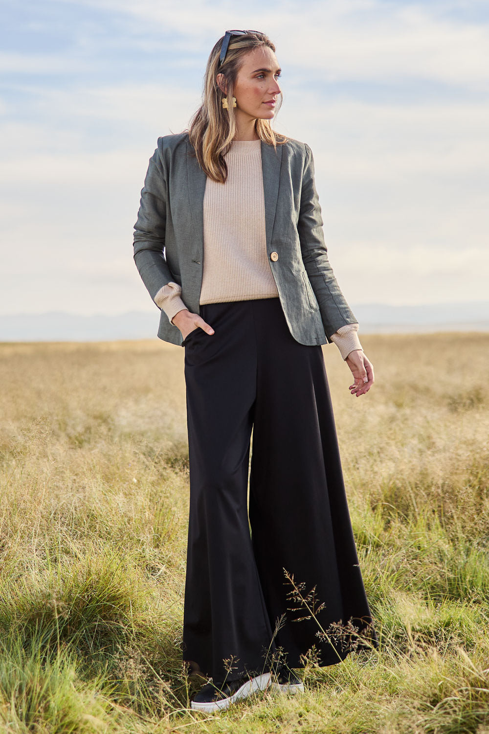 Model Tegan wearing size 10 of the Follow My Lead Side Stripe Pants in colour Black (Black), from the front, showing the whole outfit