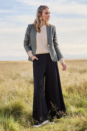 Model Tegan wearing size 10 of the Follow My Lead Side Stripe Pants in colour Black (Black), from the front, showing the whole outfit
