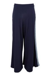 Product shot of the Follow My Lead Side Stripe Pants in colour Navy (Blue), from the back