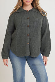 Model Chanel wearing size XL of the Cuddle Up To Me Knit Cardi in colour Gumnut (Green), from the front, cropped image