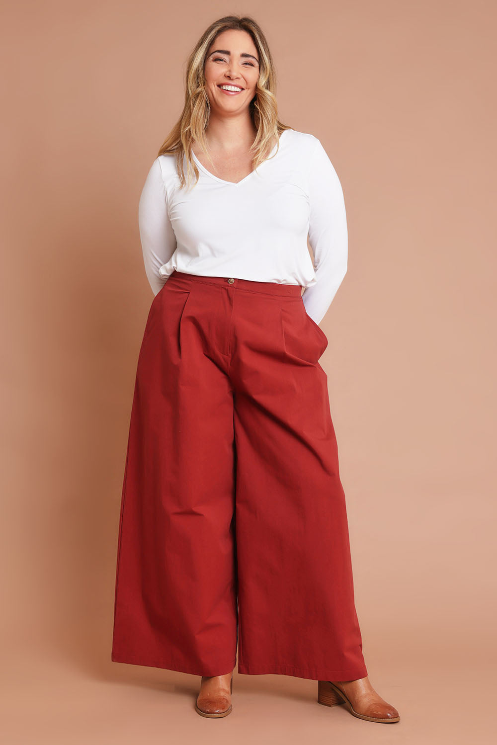 Model Chanel wearing size 16 of the Take The High Road Cotton Wide Leg Pants in colour Bordeaux (Red), from the front, showing the whole outfit