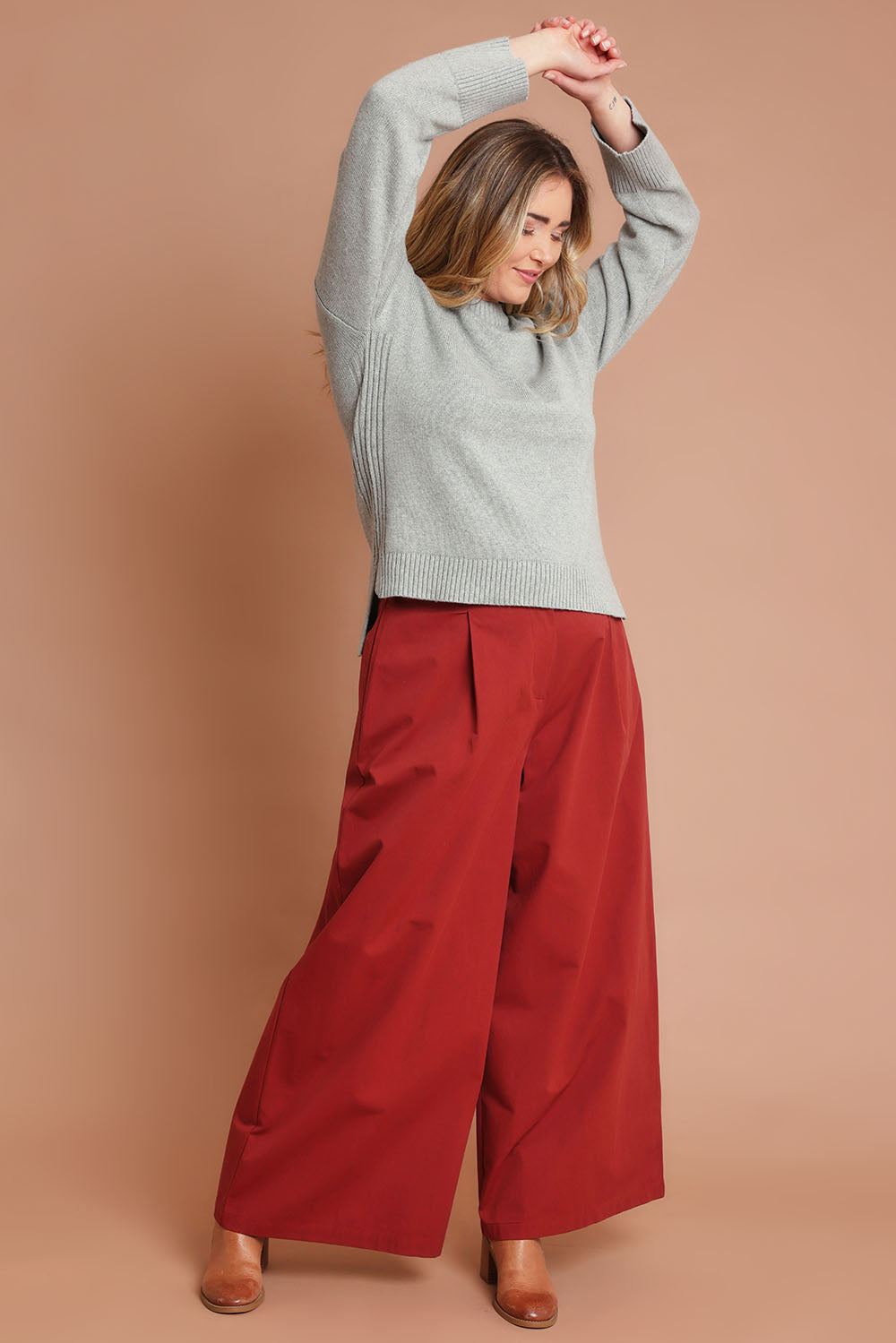 Model Chanel wearing size 16 of the Take The High Road Cotton Wide Leg Pants in colour Bordeaux (Red), from the front, showing the whole outfit
