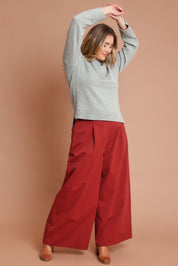 Model Chanel wearing size 16 of the Take The High Road Cotton Wide Leg Pants in colour Bordeaux (Red), from the front, showing the whole outfit