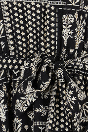 Product shot of the Wonderland Tiered Dress in colour Blackwhite (Black), detail