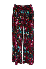 Product shot of the Flight Of Fancy Velvet Pants in colour Jewel, from the front