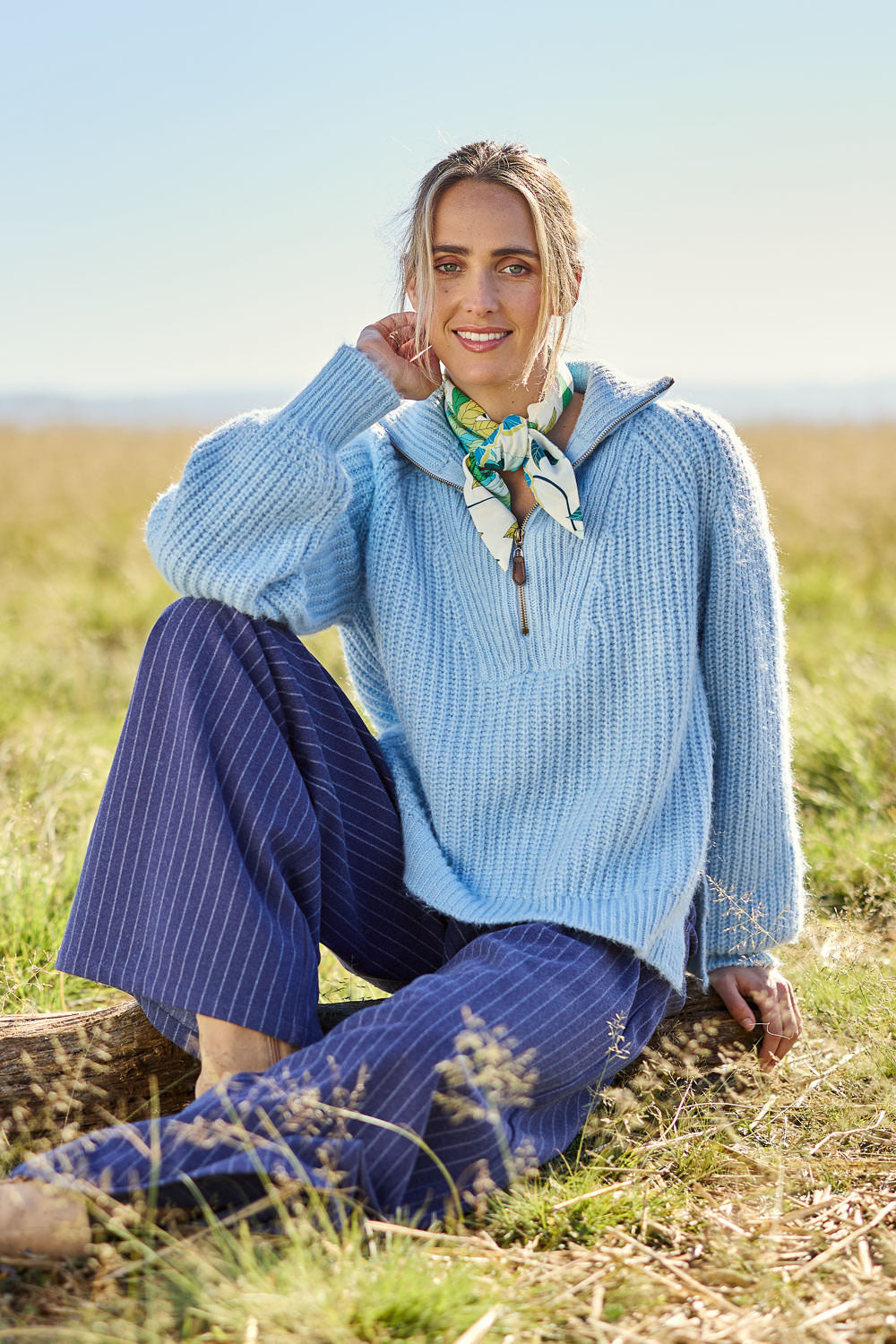 Model Tegan wearing size S of the Always Yours Half Zip Sweater in colour Babyblue (Blue), from the front, showing the whole outfit
