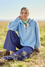 Model Tegan wearing size S of the Always Yours Half Zip Sweater in colour Babyblue (Blue), from the front, showing the whole outfit
