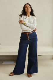 Model Tahnee wearing size 10 of the Walk This Way Wide Leg Jeans in colour Denim (Blue), from the front, showing the whole outfit