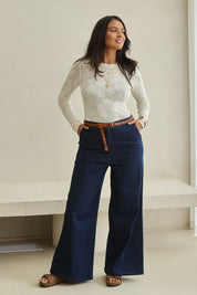 Model Tahnee wearing size 10 of the Walk This Way Wide Leg Jeans in colour Denim (Blue), from the front, showing the whole outfit